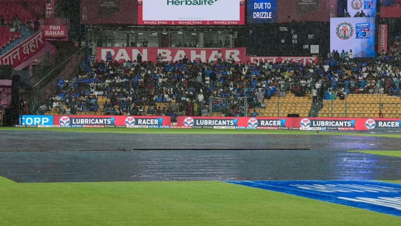 India and West Indies cricket players during rain delay at M Chinnaswamy Stadium Bengaluru