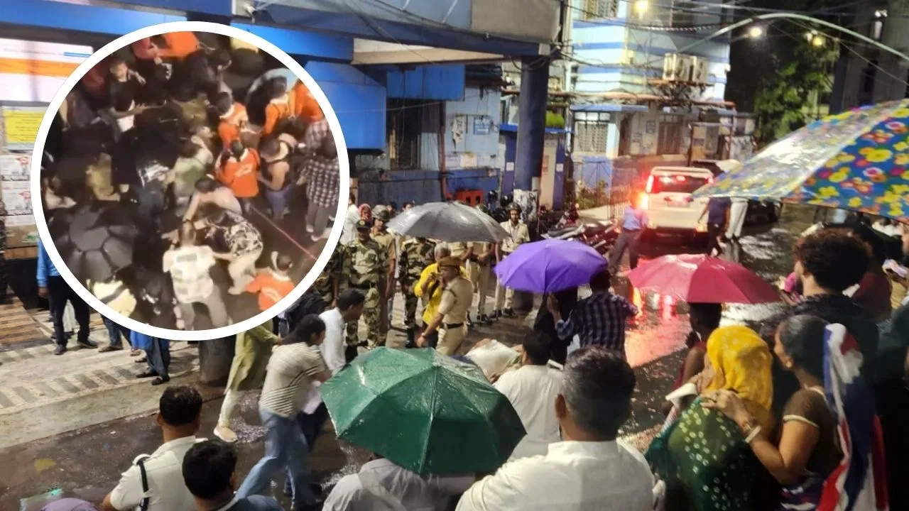 Collapsed Durga Puja pandal with crowd and emergency response in Kolkata